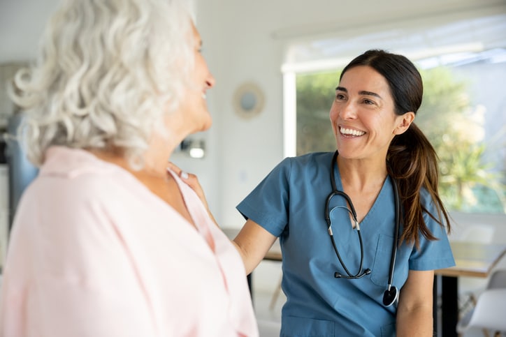 Doctor with Patient Discussing Pain Management