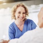 Nurse Smiling at Patient