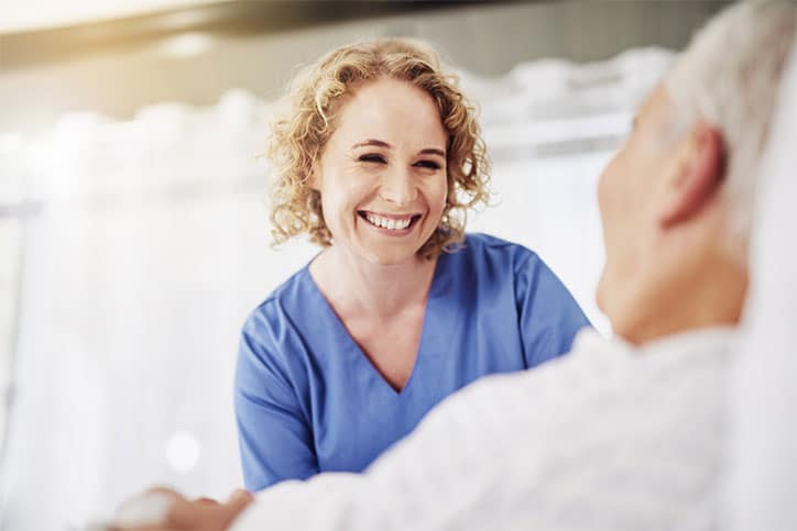 Nurse Smiling at Patient