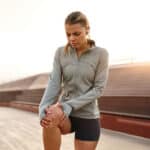 Woman runner with knee pain