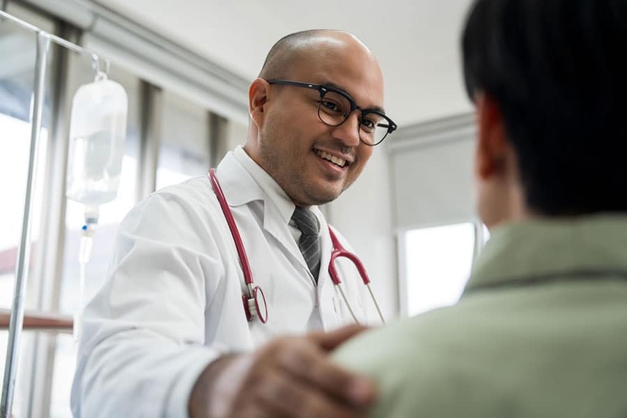 Doctor Explaining Interventional Pain Management in Macomb County